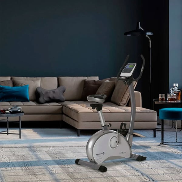 Bicicleta estática vertical PAROS Pro: compacta, silenciosa y con 16 niveles de resistencia